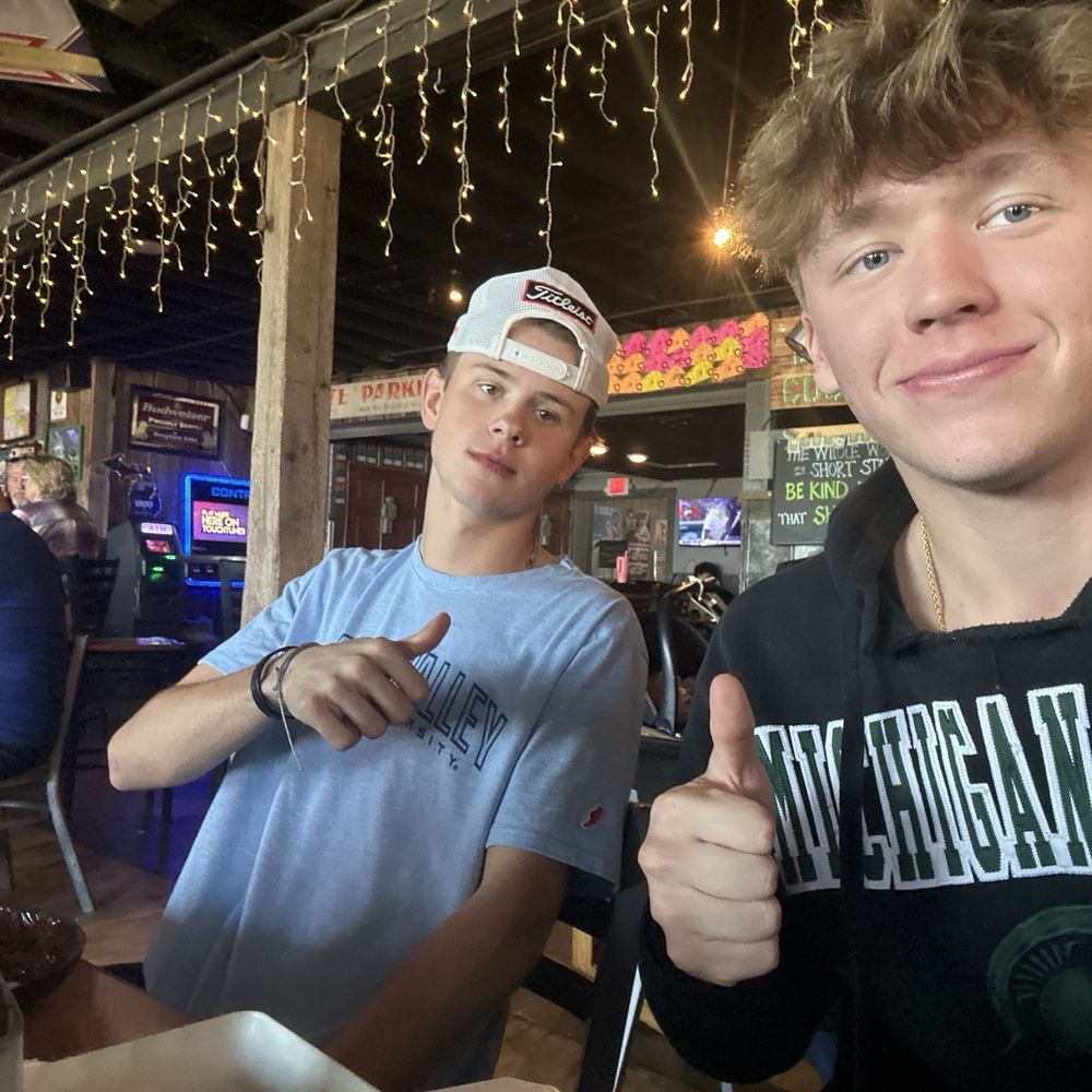 Back Door Saloon - Buddies eating good food - American Near Me - Houghton Lake, Michigan
