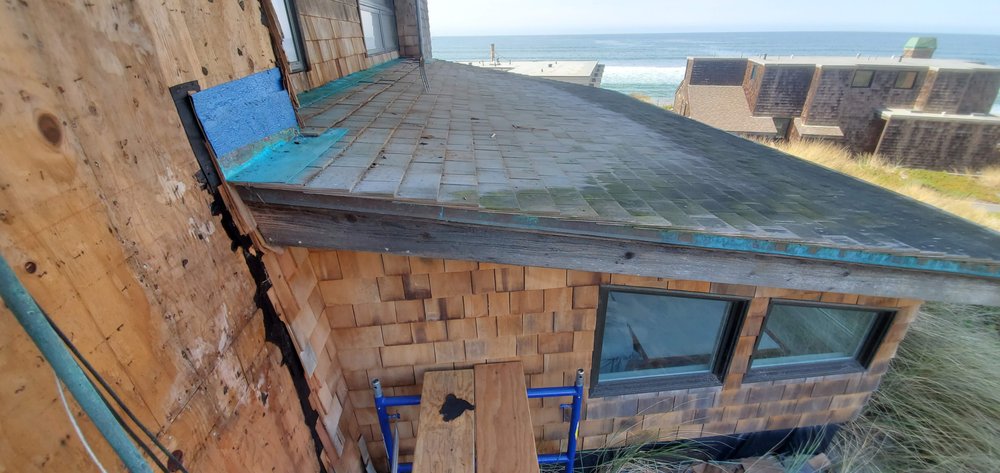 Slide of Neighbor's Roofing