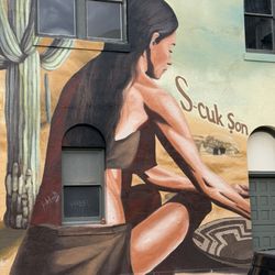 Tucson Trolley Tours - Portion of a Camila Ibarra mural depicting Tucson history. Wonderful 3D effects by integrating window and door cavities of the building