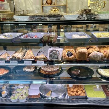 Sana'a Cafe - Sana'a Cafe pastry & sweets case. - Coffee Roasteries Near Me - Oakland, California Sana'a Cafe - Sana'a Cafe pastry & sweets case. - Coffee Roasteries Near Me - Oakland, California