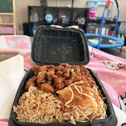 Orange Chicken combo plate with fried rice and pan fried noodles. 14$ & worth it