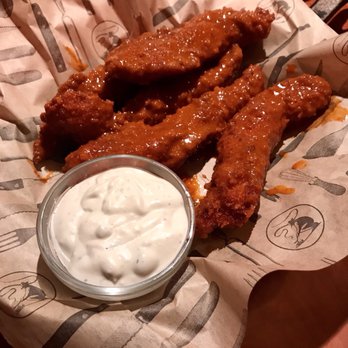 Black Angus Steakhouse - Chicken Tenders with chipotle-buffalo sauce. - Steakhouses Near Me - Glendale, Arizona Black Angus Steakhouse - Chicken Tenders with chipotle-buffalo sauce. - Steakhouses Near Me - Glendale, Arizona
