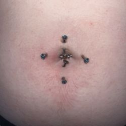 New Breed Tattoos - Belly piercings