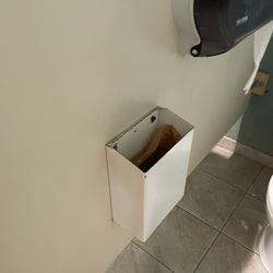 Cabrillo Fitness - Male worker in women's locker room, no barriers, open broken Kotex box
