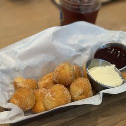 Biscuit Belly - Bonuts with bourbon cream cheese frosting and berry jam