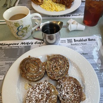 Mangrove Mike's - Pumpkin and cream cheese French toast (foreground) and eggs with bacon & breakfast potatoes (background). - Breakfast & Brunch Near Me - Islamorada, Florida Mangrove Mike's - Pumpkin and cream cheese French toast (foreground) and eggs with bacon & breakfast potatoes (background). - Breakfast & Brunch Near Me - Islamorada, Florida