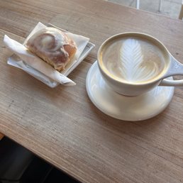 Cinnamon roll and a latte