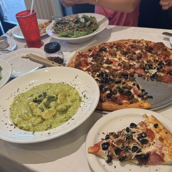 Sister Sicily - Gnocchi with creamy pesto Carnivore delight with black olives  Caesar salad House salad - Italian Near Me - Yorba Linda, California