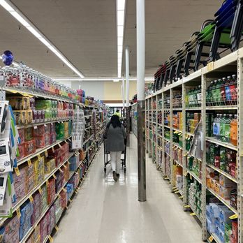 Vons - a woman walking down a grocery aisle - Grocery Near Me - Escondido, California