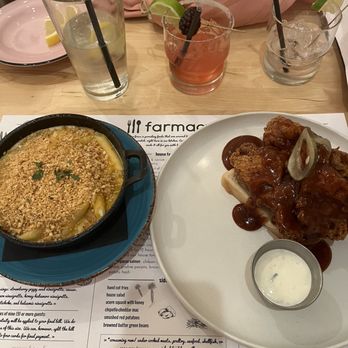 Farmacy - chipotle mac and cheese (left) and hot chicken with sweet pickles, toast, and buttermilk ranch (right) - Southern Near Me - Knoxville, Tennessee Farmacy - chipotle mac and cheese (left) and hot chicken with sweet pickles, toast, and buttermilk ranch (right) - Southern Near Me - Knoxville, Tennessee