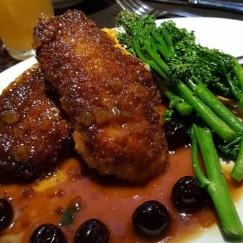 Yard House - Crusted pork loin with cherry glaze, mashed sweet potato and broccolini - New American Near Me - Indianapolis, Indiana