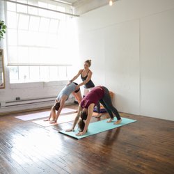 Clear Sphere Yoga - Students get hands-on assists