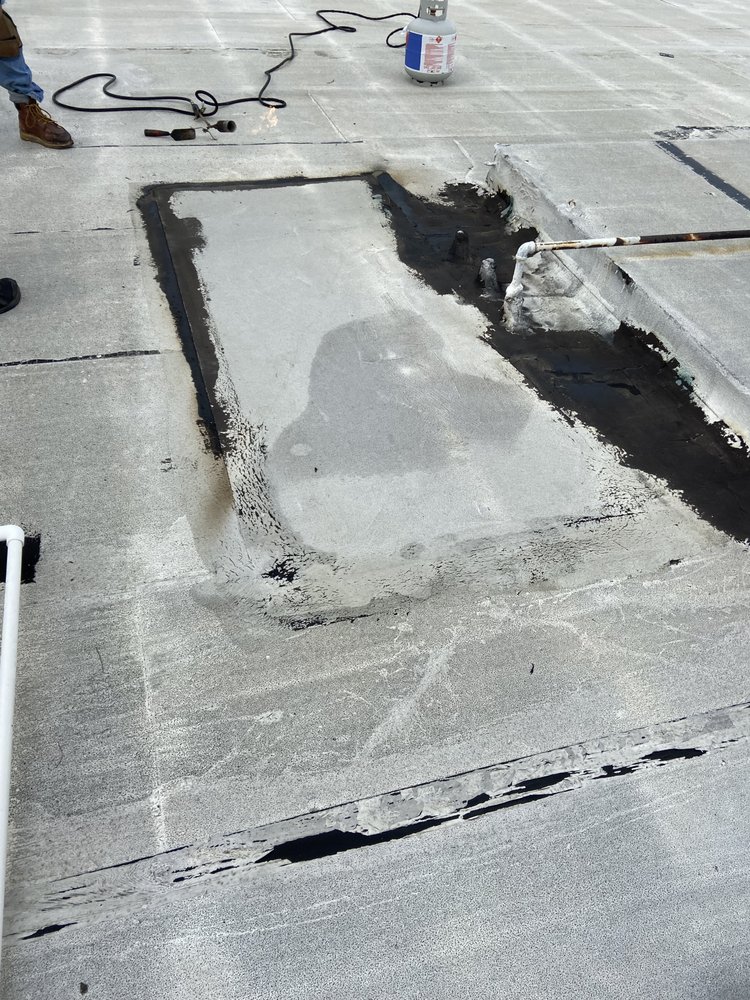 Slide of Mencho's Roofing & Repairs