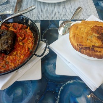 Atlantikos - Our mains salmon in leaves with orzo and the lamb pot pie - Mediterranean Near Me - Bal Harbour, Florida