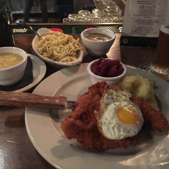 Bohemian Biergarten - Chicken schnitzel w/ German Potato Salad, Beet Salad, Späzle, and apple sauce. Damn. Don't forget the fried egg over-easy. - German Near Me - Boulder, Colorado