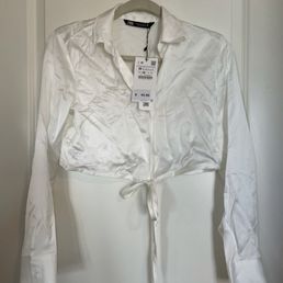 The item I tried returning. Tags attached. A little wrinkled but in perfect condition. The item I tried returning. Tags attached. A little wrinkled but in perfect condition.