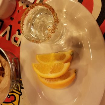 Palapas Seafood Bar - Mezcal served with orange slices. - Bars Near Me - Richardson, Texas Palapas Seafood Bar - Mezcal served with orange slices. - Bars Near Me - Richardson, Texas