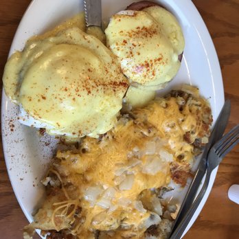 Al Smith's Place - Eggs Benedict with potatoes, onions and cheese. Absolutely delicious! - Breakfast & Brunch Near Me - Toledo, Ohio