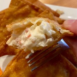 OUTSTANDING CRAB RANGOON - like good fries it's crispy on the outside but creamy inside; And Huge: 6" across with lots of filling. OUTSTANDING CRAB RANGOON - like good fries it's crispy on the outside but creamy inside; And Huge: 6" across with lots of filling.