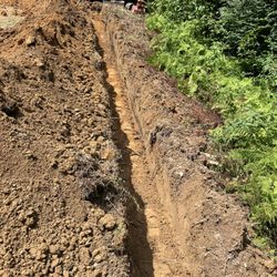 Mountain Ridge Sewer & Water Main Plumbing - nice even trench