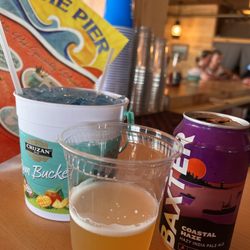 Pier Patio Pub - Blue lemonade rum bucket and local brew