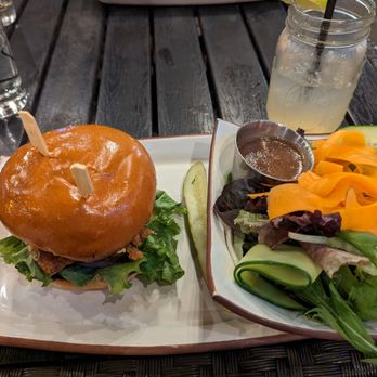 Biergarden Encinitas - Tennessee hot chicken sandwich with a side salad - New American Near Me - Encinitas, California