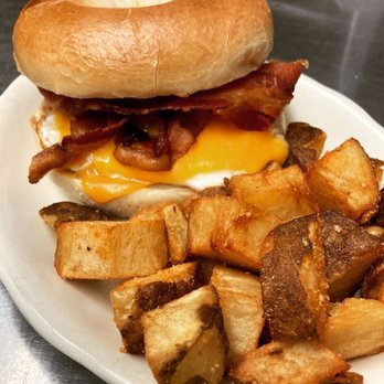 The village cafe - a breakfast sandwich with bacon, egg, and potatoes - Breakfast & Brunch Near Me - Ansonia, Connecticut The village cafe - a breakfast sandwich with bacon, egg, and potatoes - Breakfast & Brunch Near Me - Ansonia, Connecticut