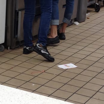 Dunkin' - Yes, that is bacon on the floor.  Which all of the employees walked over.  There is food in the corners on the floor, too. - Donuts Near Me - Orange Park, Florida