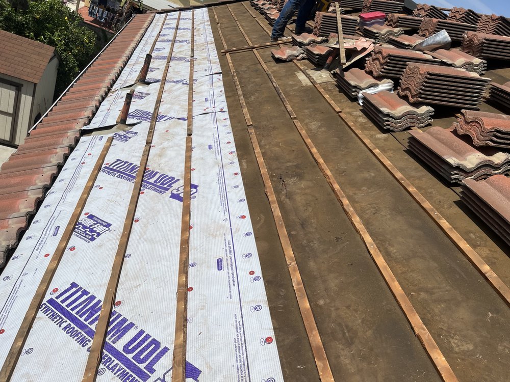 Slide of AFG Roofing Services