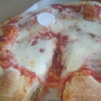 Sal's Pizza - The middle of a stuffed Chicago Supreme pizza. - Pizza Near Me - Auburndale, Florida