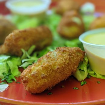 Tina's Tacos - a plate of food with dipping sauce - Mexican Near Me - Friday Harbor, Washington Tina's Tacos - a plate of food with dipping sauce - Mexican Near Me - Friday Harbor, Washington