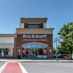Bray & Scarff - Outside view a brick building with white sign that reads "Bray & Scarff Appliances & Kitchens"