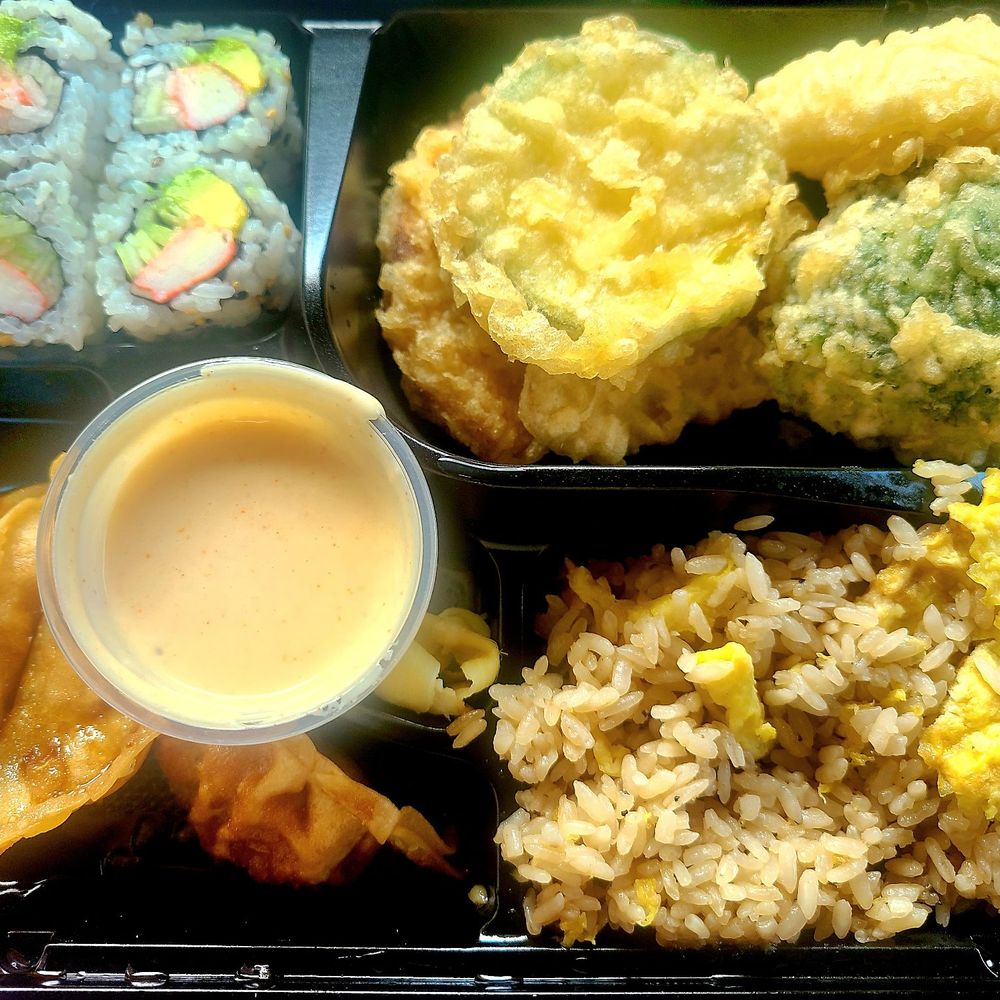 Sushi Kingdom Memphis - Bento box lunch w/veggie tempura, fried rice w/egg, gyoza, and cali roll - Sushi Bars Near Me - Memphis, Tennessee Sushi Kingdom Memphis - Bento box lunch w/veggie tempura, fried rice w/egg, gyoza, and cali roll - Sushi Bars Near Me - Memphis, Tennessee