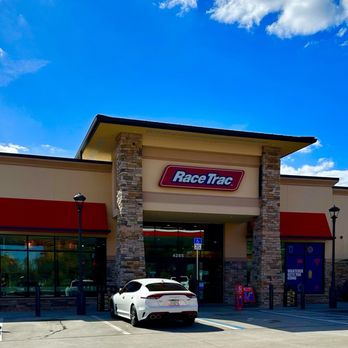 RaceTrac - a white car parked in front of a store - Gas Stations Near Me - Lakeland, Florida RaceTrac - a white car parked in front of a store - Gas Stations Near Me - Lakeland, Florida