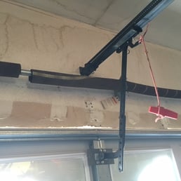 Broken garage door tension spring