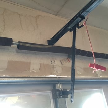 Adam Evans Door Services - Broken garage door tension spring - Garage Door Services Near Me - Big Bear, California
