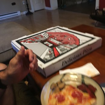 Romano's Restaurant - a slice of pizza on a plate - Pizza Near Me - Dover, Delaware