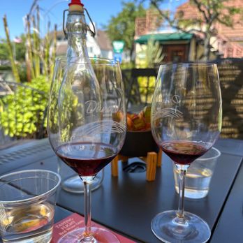 Dana V. Wines - three glasses of wine on a table - Wine Tasting Room Near Me - Solvang, California