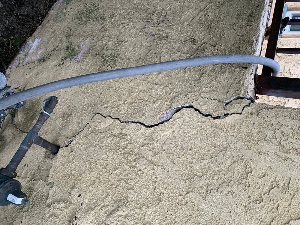 Slide of CAT Exteriors