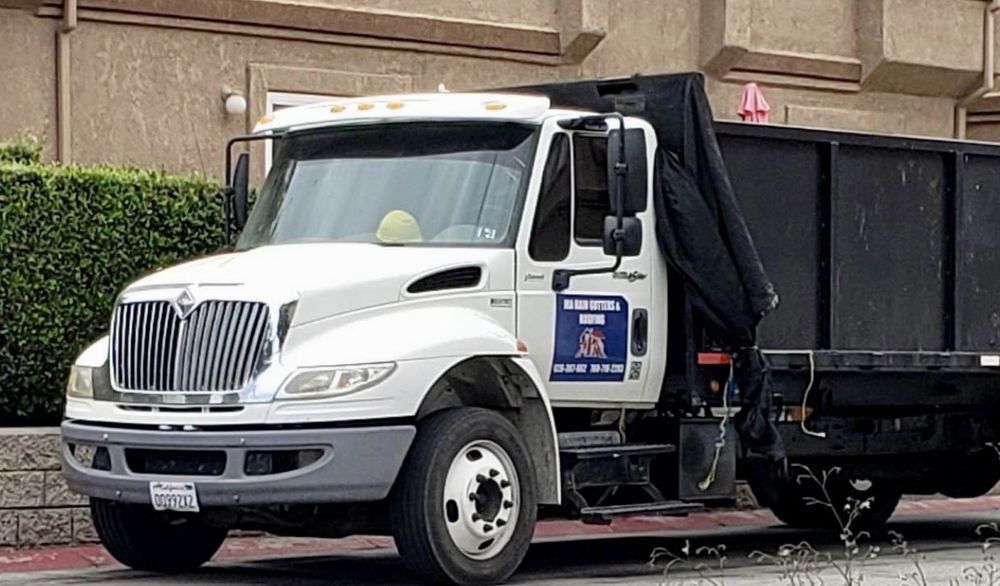 Slide of MA Rain Gutters