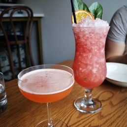 two cocktails on a table two cocktails on a table