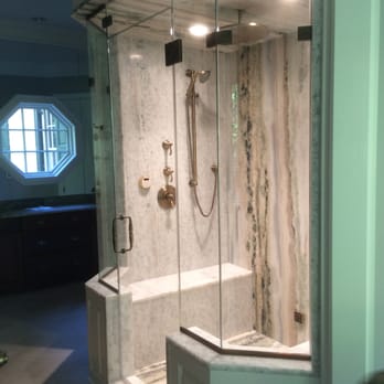 Noble Shower Doors - Gorgeous Dual Headed Steam Shower Enclosed in Clear Glass with a Transom to Vent the Steam - Glass & Mirrors Near Me Noble Shower Doors - Gorgeous Dual Headed Steam Shower Enclosed in Clear Glass with a Transom to Vent the Steam - Glass & Mirrors Near Me