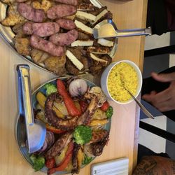 Espetáculo - Octopus, rice, and meat platter