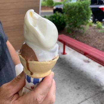 Andy's Frozen Custard - a person holding a cone of ice cream - Ice Cream & Frozen Yogurt Near Me - Spring Hill, Tennessee