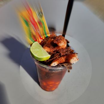 Otro Rollo Snack - a drink with a lime slice - Shaved Ice Near Me - Laredo, Texas