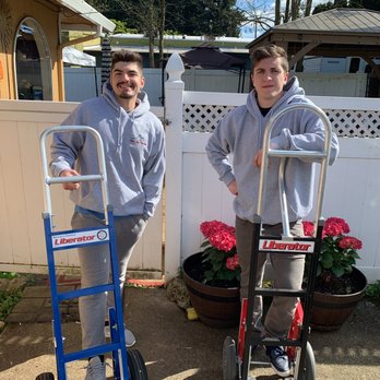 Pack My Truck - Two of our movers looking prepared for your move! - Movers Near Me Pack My Truck - Two of our movers looking prepared for your move! - Movers Near Me