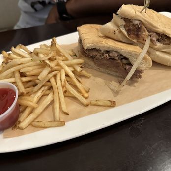 Padrino's Cuban - Boca Raton - Pan con Lechon w/ French fries - Cuban Near Me - Boca Raton, Florida Padrino's Cuban - Boca Raton - Pan con Lechon w/ French fries - Cuban Near Me - Boca Raton, Florida