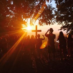 Egan Camp & Retreat Center - Sunrise is a popular time at the Cross