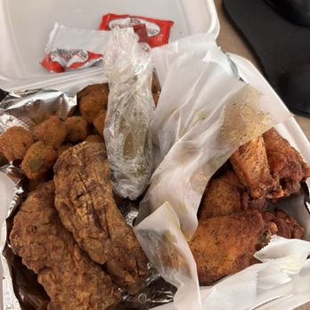 Cinco Wingz - My Order: lemon pepper wings. Dry ribs, and okra instead of fries. One pickled jalapeno, and some interesting ranch. - Food Trucks Near Me - Trinity, Texas