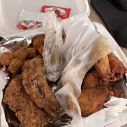 Cinco Wingz - My Order: lemon pepper wings. Dry ribs, and okra instead of fries. One pickled jalapeno, and some interesting ranch.